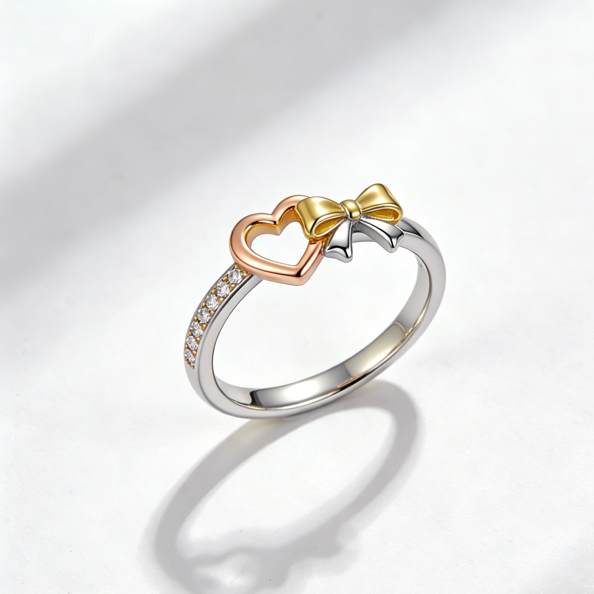 Two-Tone Heart & Bow CZ Ring
