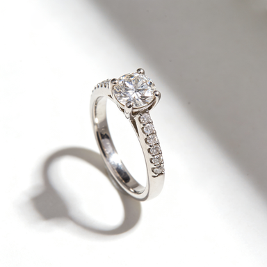 Silver Solitaire with Side Stones CZ Ring